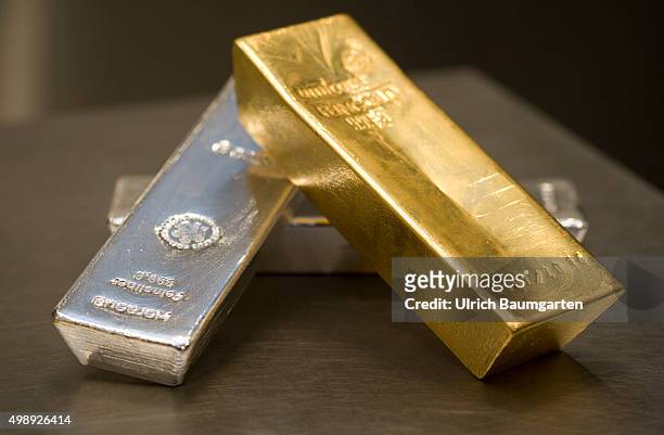 Kg and 1 kg gold bullions and two 5 kg silver bullions in the strong room of pro aurum goldhouse in Munich.