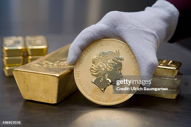 One 12,5 kg gold bullion, 1 kg gold bullions and the Australian Nugget in the strong room of pro aurum goldhouse in Munich.