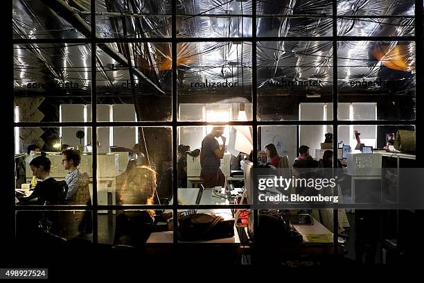 Tech entrepreneurs work in the offices of CoworkLisboa which provides office space for start-ups in Lisbon, Portugal, on Wednesday, Nov. 18, 2015....