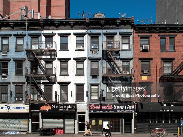 old residential buildings along 3rd avenue, manhattan, new york city - east village stock pictures, royalty-free photos & images