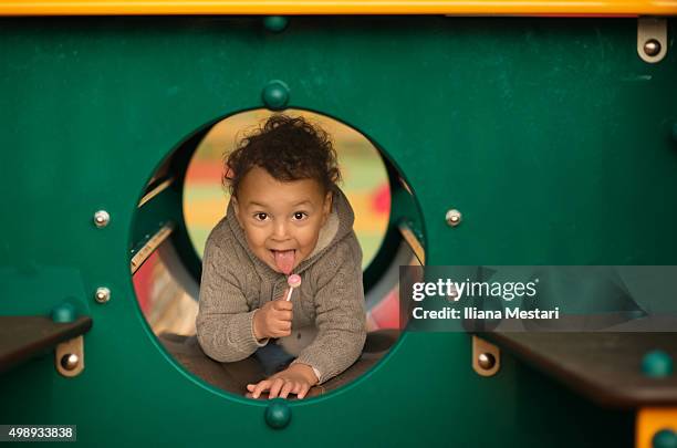 portrait of a little boy on a playground - bryant park foto e immagini stock