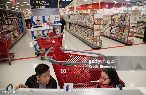 Customers browse items for sale at a Target Corp. Store in Jersey City, New Jersey, U.S., on Friday, Nov. 27, 2015. In 2011, several big U.S....