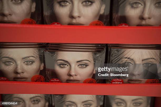 Copies of the new Adele album "25" are displayed at a Target Corp. Store in Jersey City, New Jersey, U.S., on Friday, Nov. 27, 2015. In 2011, several...