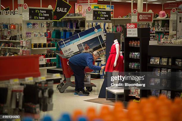 Customer browses at a Target Corp. Store in Jersey City, New Jersey, U.S., on Friday, Nov. 27, 2015. In 2011, several big U.S. Retailers moved their...