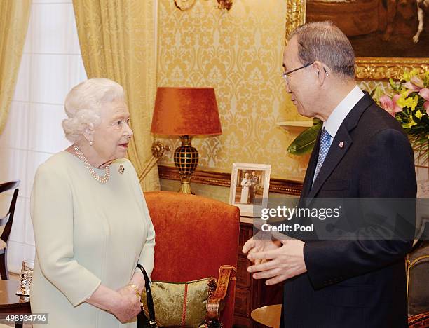Queen Elizabeth II talks to the Secretary General of the United nations Ban Ki Moon during a private audience at the San Anton Palace on November 27,...