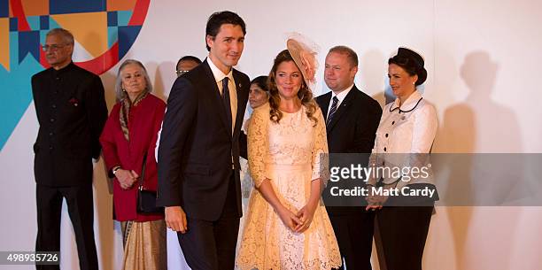 Canadian Prime Minister Justin Trudeau and his wife Sophie Gregoire arrive at CHOGM opening ceremony at the Mediterranean Conference Centre on...