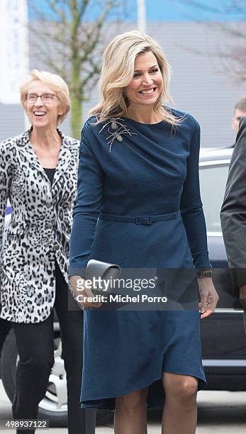 Queen Maxima of The Netherlands wearing a dress by Danish designer Claes Iversen arrives to attend the "Kracht On Tour" Financial support workshops...