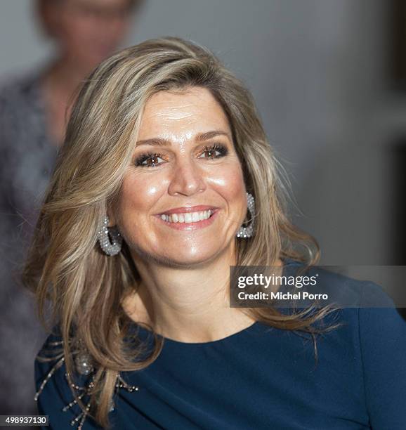 Queen Maxima of The Netherlands wearing a dress by Danish designer Claes Iversenleaves after attending the "Kracht On Tour" Financial support...