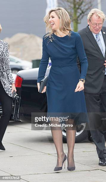 Queen Maxima of The Netherlands wearing a dress by Danish designer Claes Iversen arrives for the "Kracht On Tour" financial support workshops for...