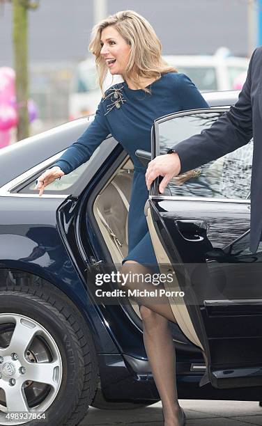 Queen Maxima of The Netherlands wearing a dress by Danish designer Claes Iversen arrives for the "Kracht On Tour" financial support workshops for...