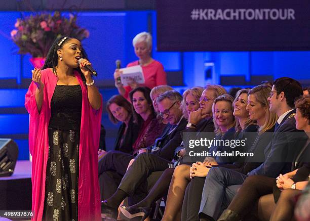Queen Maxima of The Netherlands watches a performance by Kizzy during the "Kracht On Tour" financial support workshops for women at the Fokker...
