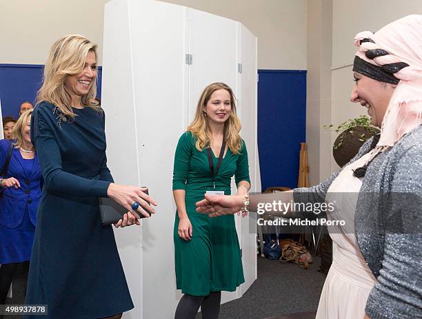 Queen Maxima of The Netherlands wearing a dress by Danish designer Claes Iversen meets women during the "Kracht On Tour" financial support workshops...