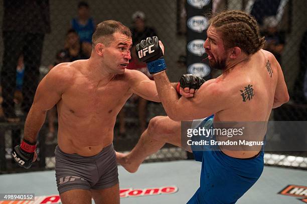 Artem Lobov punches Chris Gruetzemacher during the filming of The Ultimate Fighter: Team McGregor vs Team Faber at the UFC TUF Gym on August 18, 2015...