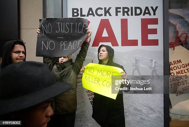 Demonstrators protest the shooting of Laquan McDonald along the Magnificent Mile November 27, 2015 in Chicago, Illinois. Chicago police officer Jason...