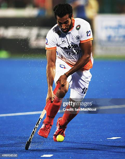 Dharamvir Singh of India controls the ball during the match between Argentina and India on day one of The Hero Hockey League World Final at the...