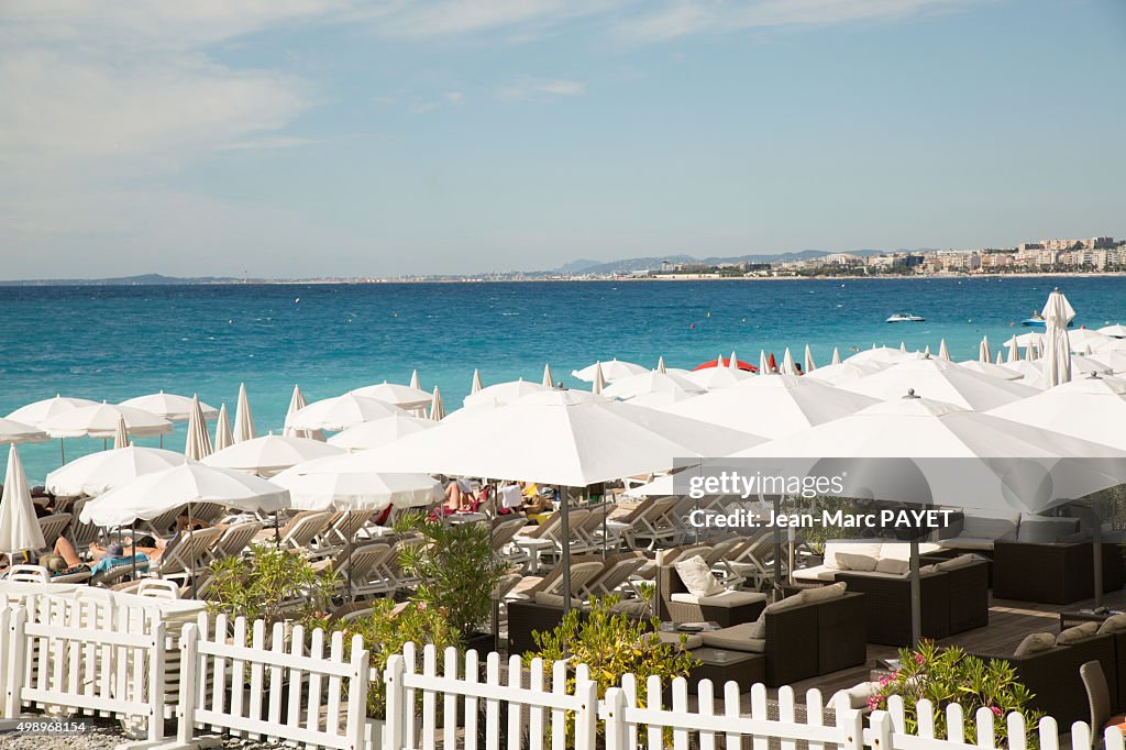 Umbrellas on the beach in Nice, French Riviera