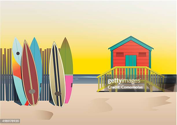 summer beach huts and surf boards - beach hut stock illustrations