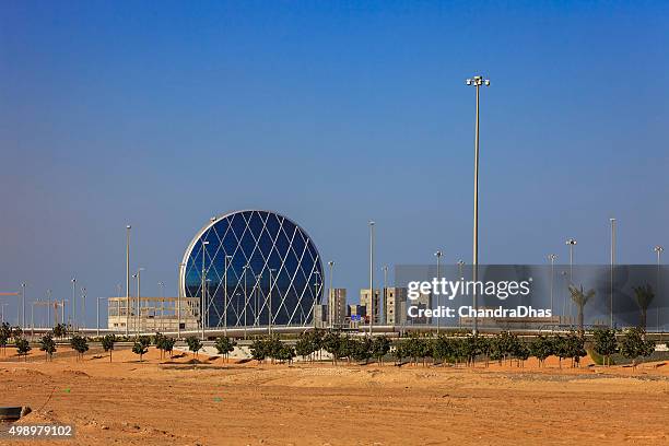 abu dhabi, uae: from desert sands rises modern architecture. - abu dhabi bridge stock pictures, royalty-free photos & images