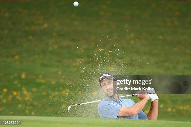 Geoff Ogilvy of Australia plays out of a bunker on the 5th hole during day three of the 2015 Australian Open at The Australian Golf Club on November...