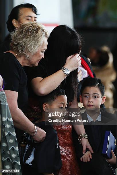 Widow of Jonah Lomu, Nadene Lomu follows behind the casket carrying the body of Jonah Lomu with her mother Lois Kuiek and her two sons, Brayley Lomu...