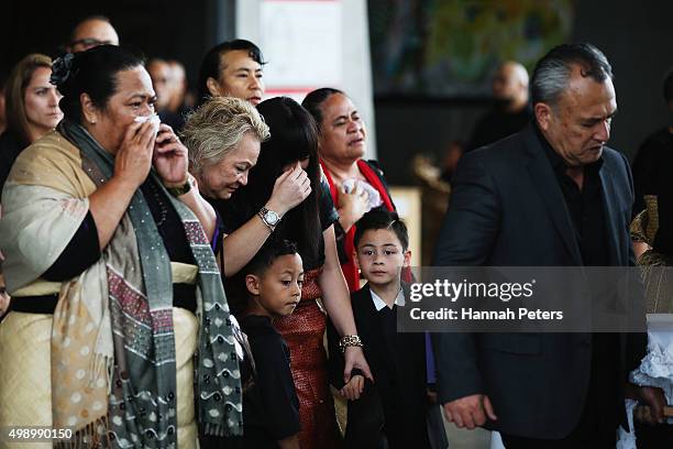 Widow of Jonah Lomu, Nadene Lomu follows behind the casket carrying the body of Jonah Lomu with her mother Lois Kuiek and her two sons, Brayley Lomu...