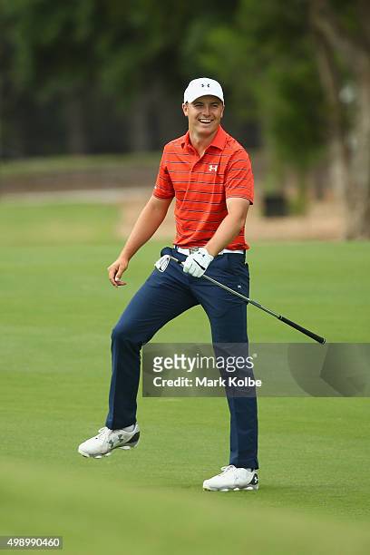 Jordan Spieth of the United States celebrates after holing his approach shot for an eagle on the 17th hole during day three of the 2015 Australian...