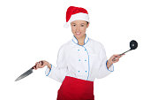 Asian chef in christmas cap with container