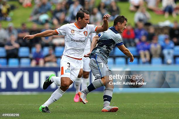 Shane Sefanutto of the Roar contests the ball against Enver Alivodic of the Jets during the round eight A-League match between the Newcastle Jets and...