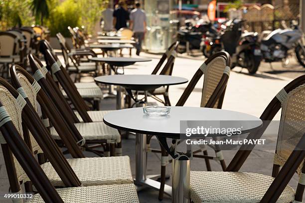 typical café terrace, france - personne non reconnaissable stock pictures, royalty-free photos & images