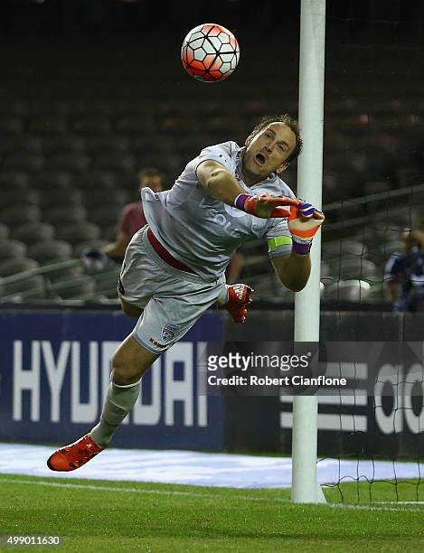 Adelaide United goalkeeper Eugene Galekovic makes a save during the round eight A-League match between Melbourne City FC and Adelaide United at...