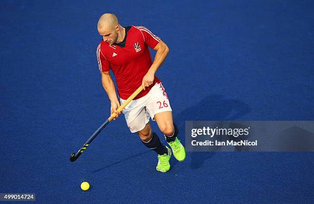 Nick Catlin of Great Britain strikes the ball during the match between Great Britain and Canada on day two of The Hero Hockey League World Final at...