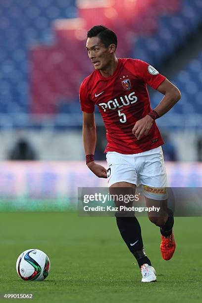 Tomoaki Makino of Urawa Red Diamonds in action during the J.League 2015 Championship semi final match between Urawa Red Diamonds and Gamba Osaka at...