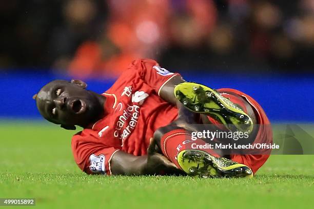 Mamadou Sakho of Liverpool goes down injured during the Barclays Premier League match between Liverpool and Crystal Palace at Anfield on November 8,...