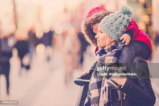 winter walk around the city - winter coat stock pictures, royalty-free photos & images