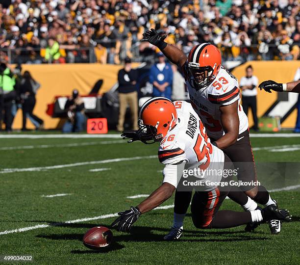 Linebackers Karlos Dansby and Craig Robertson of the Cleveland Browns pursue a loose football during a game against the Pittsburgh Steelers at Heinz...