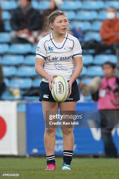 Koishybayeva Balzhan of Kazakhstan looks on with the ball during the World Sevens Asia Olympic Qualification match between China and Kazakhstan at...