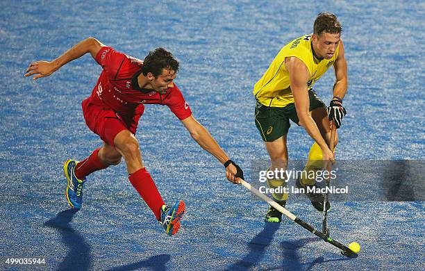 Simon Gougnard of Belgian vies with Simon Orchard of Australia during the match between Australia and Belgium on day two of The Hero Hockey League...