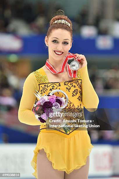 Courtney Hicks of the USA poses with her silver medal during the day two of the NHK Trophy ISU Grand Prix of Figure Skating 2015 at the Big Hat on...