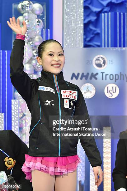 Satoko Miyahara of Japan celebrates after winning gold in the ladies's free skating during the day two of the NHK Trophy ISU Grand Prix of Figure...