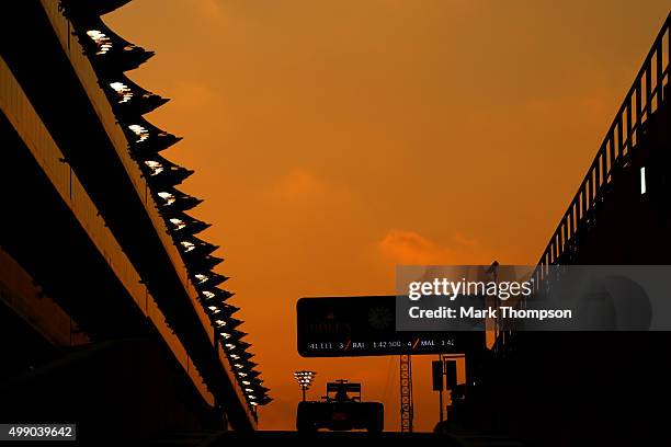 Daniil Kvyat of Russia and Infiniti Red Bull Racing drives during qualifying for the Abu Dhabi Formula One Grand Prix at Yas Marina Circuit on...