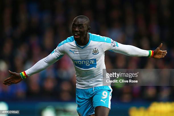 Papiss Demba Cisse of Newcastle United celebrates scoring his team's first goal during the Barclays Premier League match between Crystal Palace and...