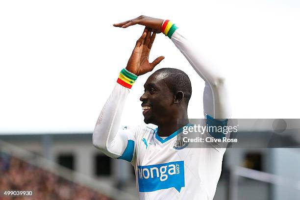 Papiss Demba Cisse of Newcastle United celebrates scoring his team's first goal during the Barclays Premier League match between Crystal Palace and...
