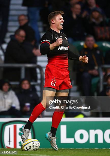 Chris Ashton of Saracens celebrates after scoring the first try of the game during the Aviva Premiership match between Saracens and Worcester...