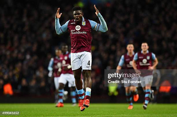 Micah Richards of Aston Villa celebrates scoring his team's first goal during the Barclays Premier League match between Aston Villa and Watford at...