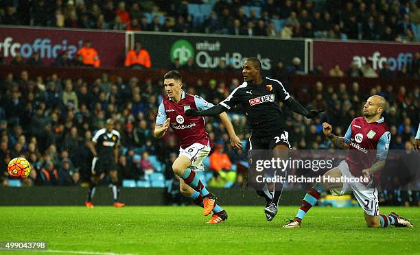 Alan Hutton of Aston Villa kicks the ball resulting in the own goal during the Barclays Premier League match between Aston Villa and Watford at Villa...