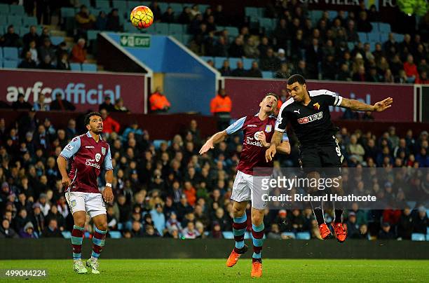 Troy Deeney of Watford scores his team's third goal during the Barclays Premier League match between Aston Villa and Watford at Villa Park on...