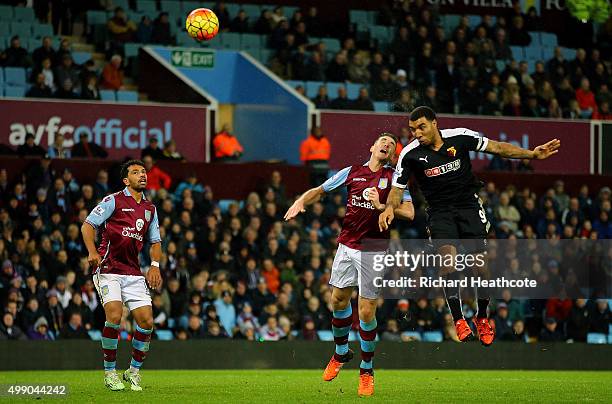 Troy Deeney of Watford scores his team's third goal during the Barclays Premier League match between Aston Villa and Watford at Villa Park on...