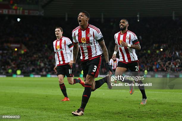 Patrick van Aanholt of Sunderland celebrates scoring his team's first goal during the Barclays Premier League match between Sunderland and Stoke City...