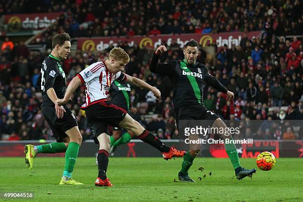 Duncan Watmore of Sunderland scores his team's second goal during the Barclays Premier League match between Sunderland and Stoke City at Stadium of...