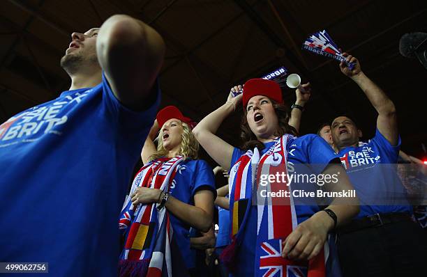 The Great Britain fans sing loudly at the change of ends for Andy Murray and Jamie Murray of Great Britain in their doubles match against Steve...